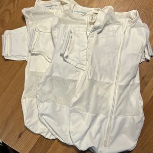 Three size small SNOO sacks